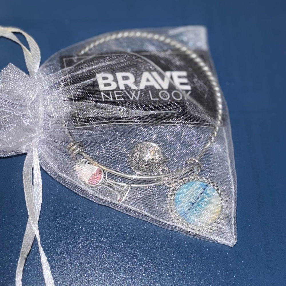 Brave New Look Silver Charm Bracelet with charm with saying new with tags